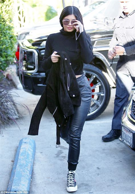 Kylie Jenner Shows Off Her Flat Stomach In Cropped Sweater And Leather