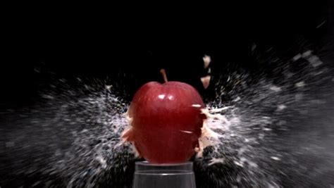 Stock Video Clip Of Slow Motion Bullet Through An Apple Shutterstock