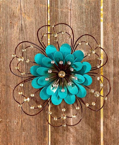 Add these stunning wall plaques to your interior to make it stand out a little. Jeweled Metal Wall Flowers - Blue, Brightly colored ...