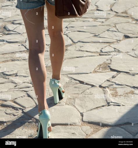 Woman Wearing High Heels Walking On Paving Stone Waikiki Honolulu