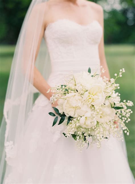 bouquet with peonies and lily of the valley
