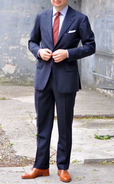The number of buttons on the suit gives a proper look according to the body type. Brown suits. - Page 2
