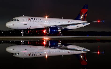 White Delta Airplane Aircraft Passenger Aircraft Night Reflection