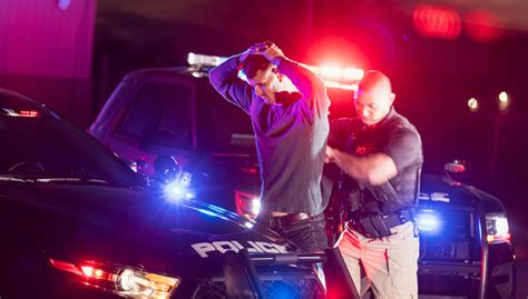 Police Officer Making An Arrest Stock Photo Download Image Now Istock