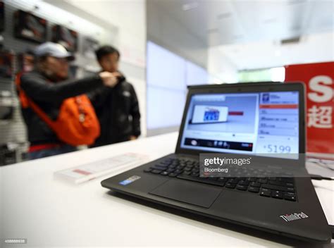 A Lenovo Group Ltd Computer Sits On Display At The Companys News