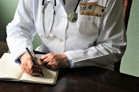 An Image Of A Writing Doctor With Stethoscope Stock Image Image Of