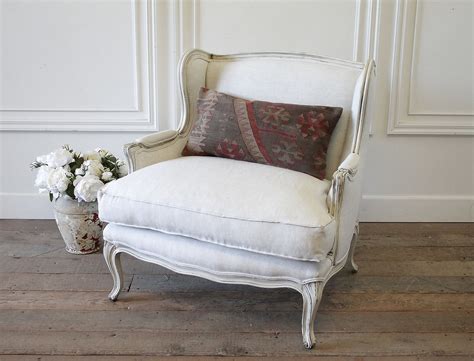 Vintage French Provincial Wing Back Style Chair Upholstered In Natural