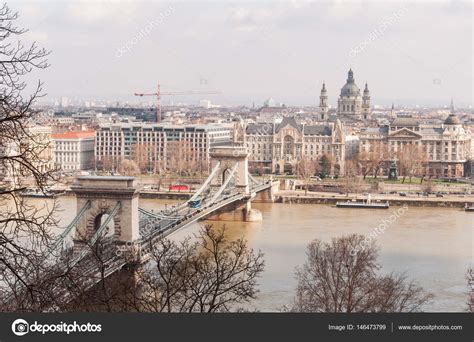 View Of The Szechenyi Chain Bridge And Church St Stephens In Budapest