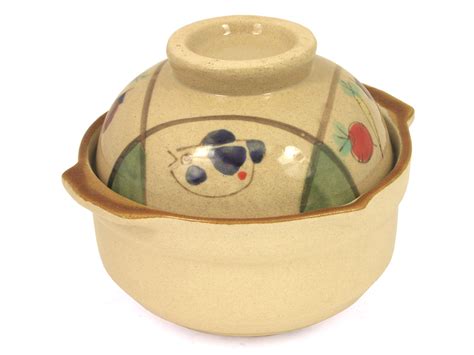 Welcome to the woks of life chinese cooking tools page! Unique Fish and Veggie Earthen Chinese Clay Pot