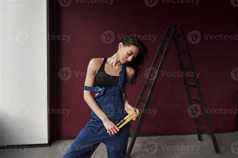 Beautiful Female Worker Young Housewife Decided To Glue Wallpaper In Her New House In The Room