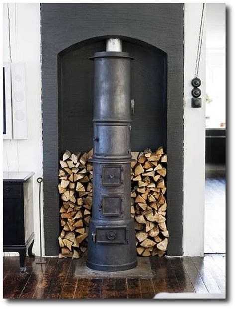 The scandinavian wood stove adds warmth to the modern space. 75 Swedish Nordic Pinterest Pages! Oh Yes…More Eye Candy!