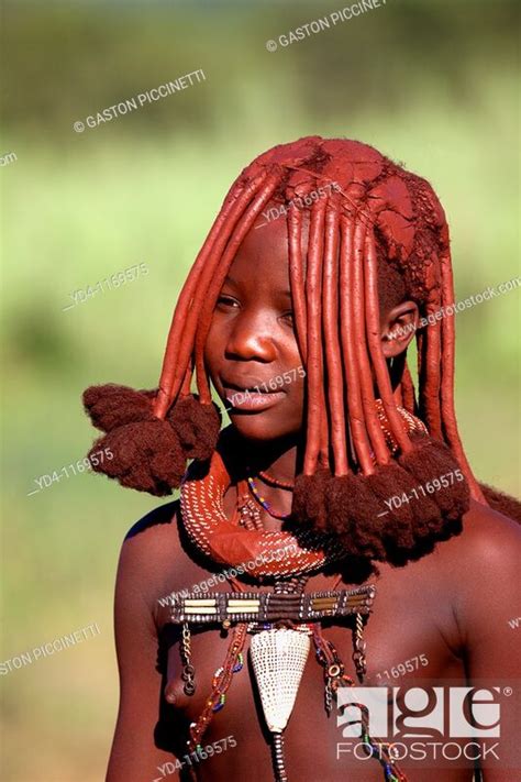 Himba Girl With The Typical Hairstyle Opuwo Namibia Stock Photo