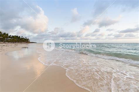 Gentle Waves On The Beach At Sunset Royalty Free Stock Image Storyblocks