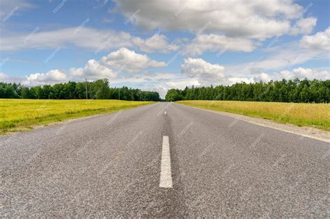 Premium Photo Country Road In Summer Landscape Of Field Forest And