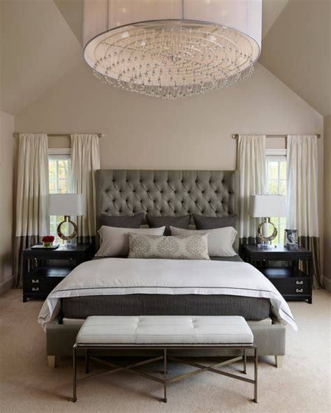 Transitional Bedroom With Large Chandelier 