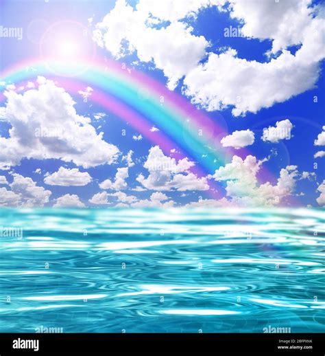 Ocean Water And Beautiful Rainbow In Sky Stock Photo Alamy