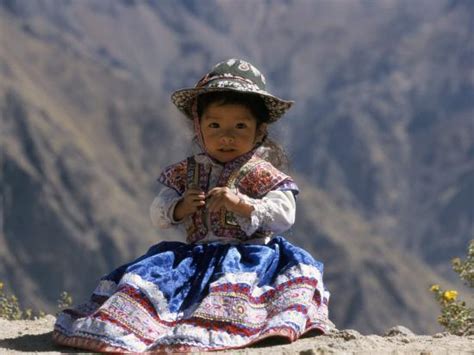Little Girl In Traditional Dress Colca Canyon Peru South America