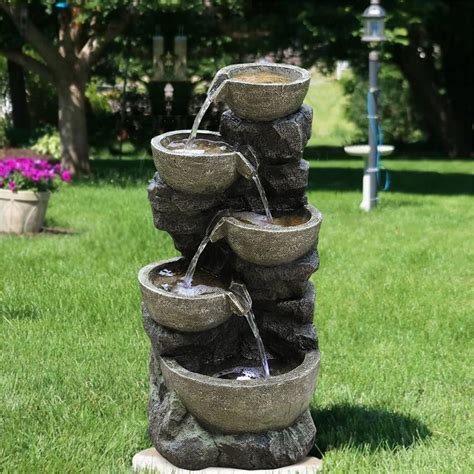 Sleek modern look in this stainless steel fountain. Faux Stone Outdoor Water Fountain, Zen Garden Cascading ...