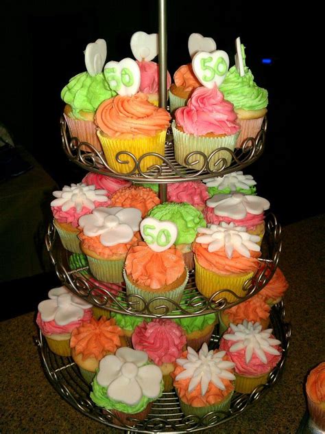 See our list of monthly birth flowers and learn the meanings behind them! 50 Cupcakes for a 50th birthday. Rainbow chip cake with ...
