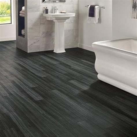 A wood plank ceiling offers the same classic décor as a wood plank floor, so why not hang one in your house? Black Oak 18cm x 122cm Luxury Vinyl Flooring - Wet Walls ...