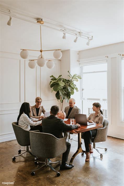 Download Premium Image Of Happy Business People In A Meeting 1216677 ใน