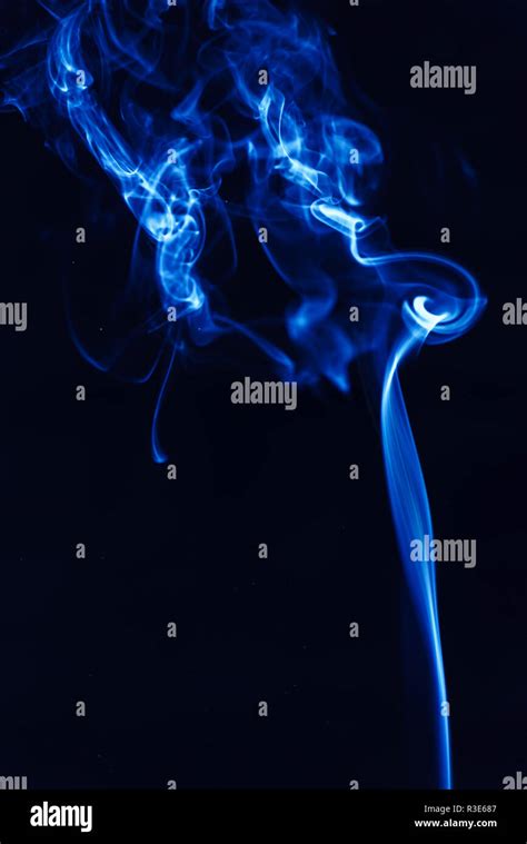 Blue Smoke On A Black Background Stock Photo Alamy