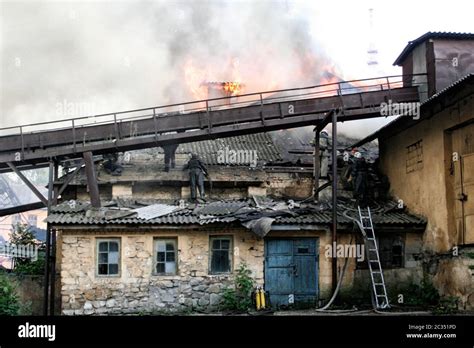 firefighters extinguish a fire in an apartment house Stock Photo - Alamy