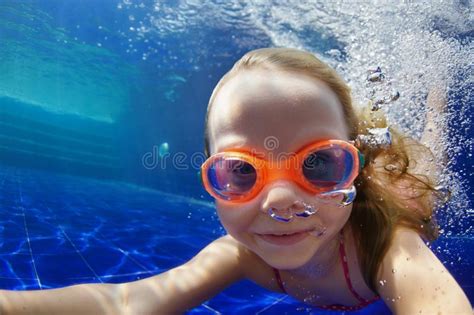 Funny Child In Goggles Dive In Swimming Pool Stock Photo Image Of