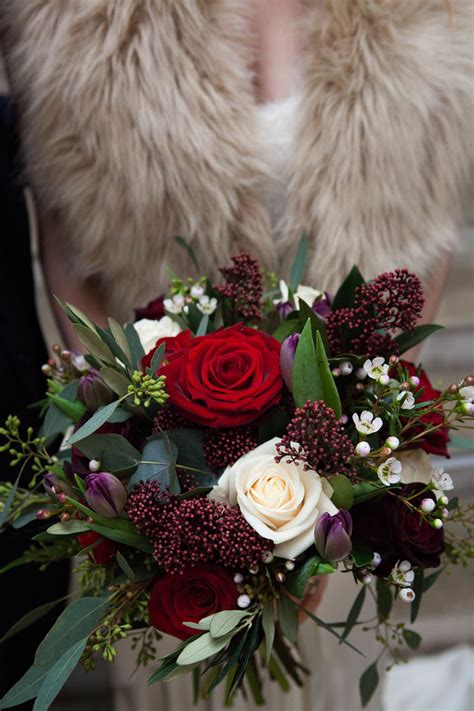 Have fun with your winter wedding with lots of seasonal signage, baby it's cold outside, be the look and texture of natural cotton is so beautiful for a winter wedding, use it for bouquets, wreaths. Winter Bridal bouquet at Farnham Castle. Bouquet made of ...