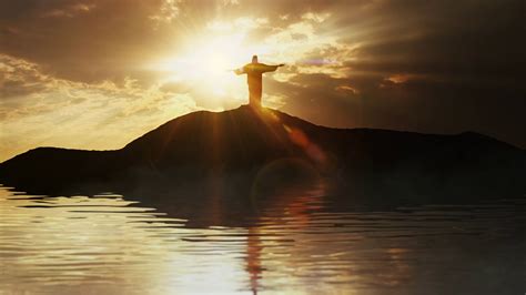 Silhouette of Jesus on a shore at sunrise Stock Video Footage 00:10 SBV