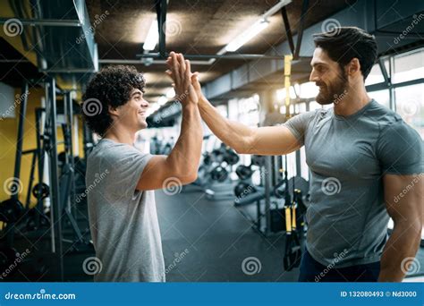 Men High Fiving At The Modern Gym Stock Image Image Of Club