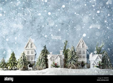 Frosty Winter Wonderland Forest With Snowfall Houses And Trees
