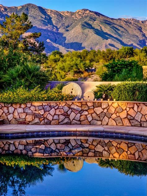 Maybe you would like to learn more about one of these? steinmauer im garten mediterran steinplatten pool ...