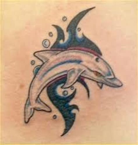 A blend of two styles can make great tattoo designs. Dolphin Tattoo Designs And Dolphin Tattoo Meanings-Dolphin ...