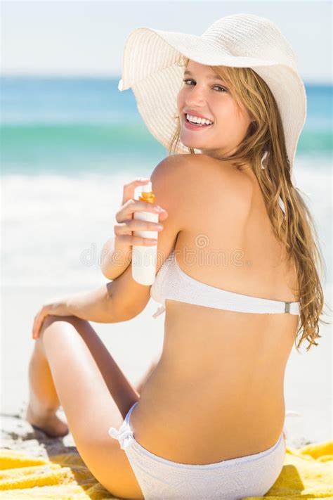 Pretty Blonde Woman Putting Sun Tan Lotion Her Shoulder Photos Free Royalty Free Stock