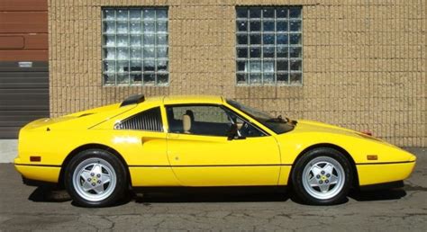 Like so many of its brethren, it wore a red overcoat, but giallo fly yellow was its original color. 1989 Ferrari 328 GTS - RARE Giallo FER 102 (Fly Yellow) with Tan Interior