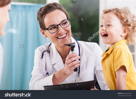 Stock Photo Happy Little Boy After Health Exam At Doctor S Office