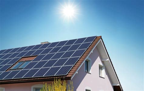 The price per watt for solar panels can range from $2.50. House With Solar Panels On The Roof Stock Photo - Download ...