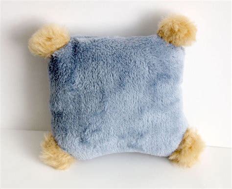 You know they need greens if they are eating houseplants. Cat toy catnip Kicker Cushion pillow grey with pompons ...