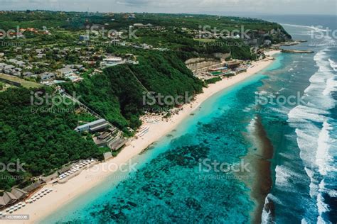 Aerial View Of Popular Beach With Turquoise Ocean And Waves In Bali