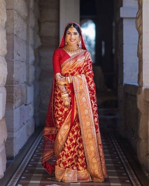 30 Real Brides Who Donned Red Bridal Saree For Their Wedding Day In 2021 Indian Bridal Dress