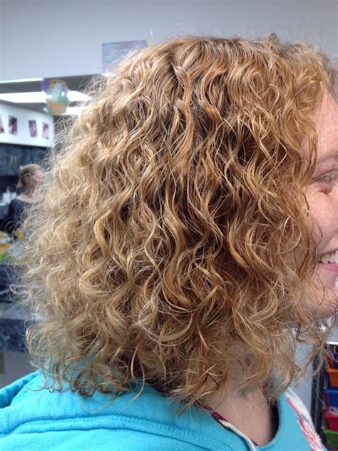 perm with looser curl in medium length permed hairstyles perm really long hair