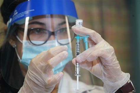 Covid vaccine rollout gives CVS, Walgreens a chance to bring health
