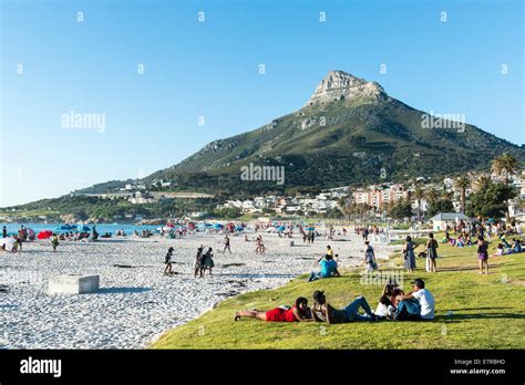 People On The Beach Of Camps Bay Cape Town South Africa Stock Photo