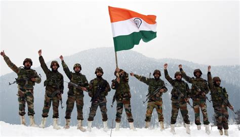 Army Jawans Hold The National Flag And Raise Slogans Near The Snow