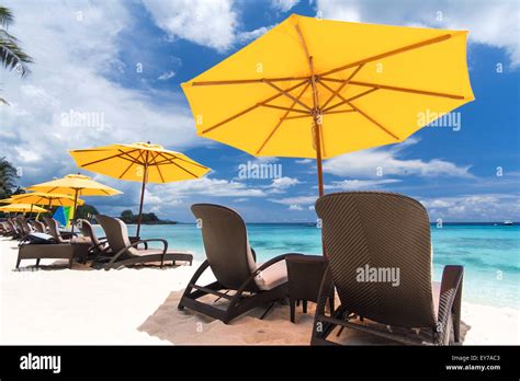 Sun Umbrella And Beach Beds On Tropical Beach Stock Photo Alamy