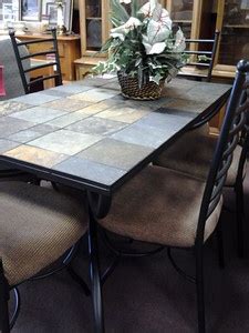 Seats up to 4 people, ideal for any dining area, such as a kitchen, dining room, dinette, or small apartment. Tile dining table - theradmommy.com