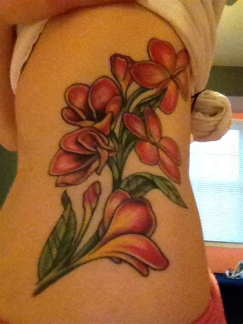 Frangipani tattoo design would want some colour and incorporate the kids names somewhere in there. Plumerias - Make shoulder piece, B leaves | Plumeria ...