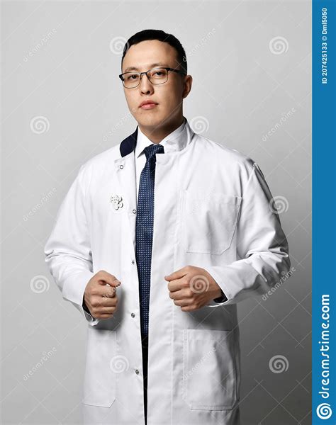 Portrait Of Young Man Doctor Urologist Or Proctologist In Glasses