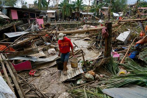 Typhoon Leaves 12 Dead Traps People On Roofs In Philippines The